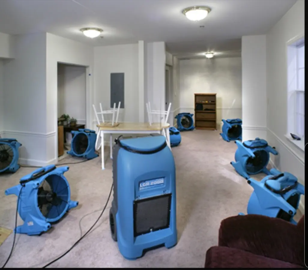 Air movers and dehumidifier setup for Water Damage Restoration in Norwalk